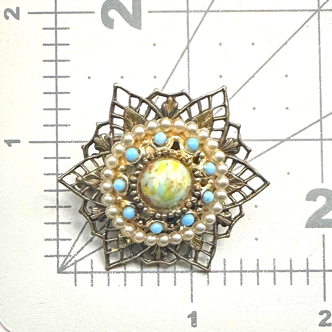 Vintage gold tone filigree faux pearl turquoise confetti lucite cabochon brooch