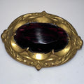 Antique 1900s Arts Crafts Nouveau gold gilt brass purple glass sash pin brooch