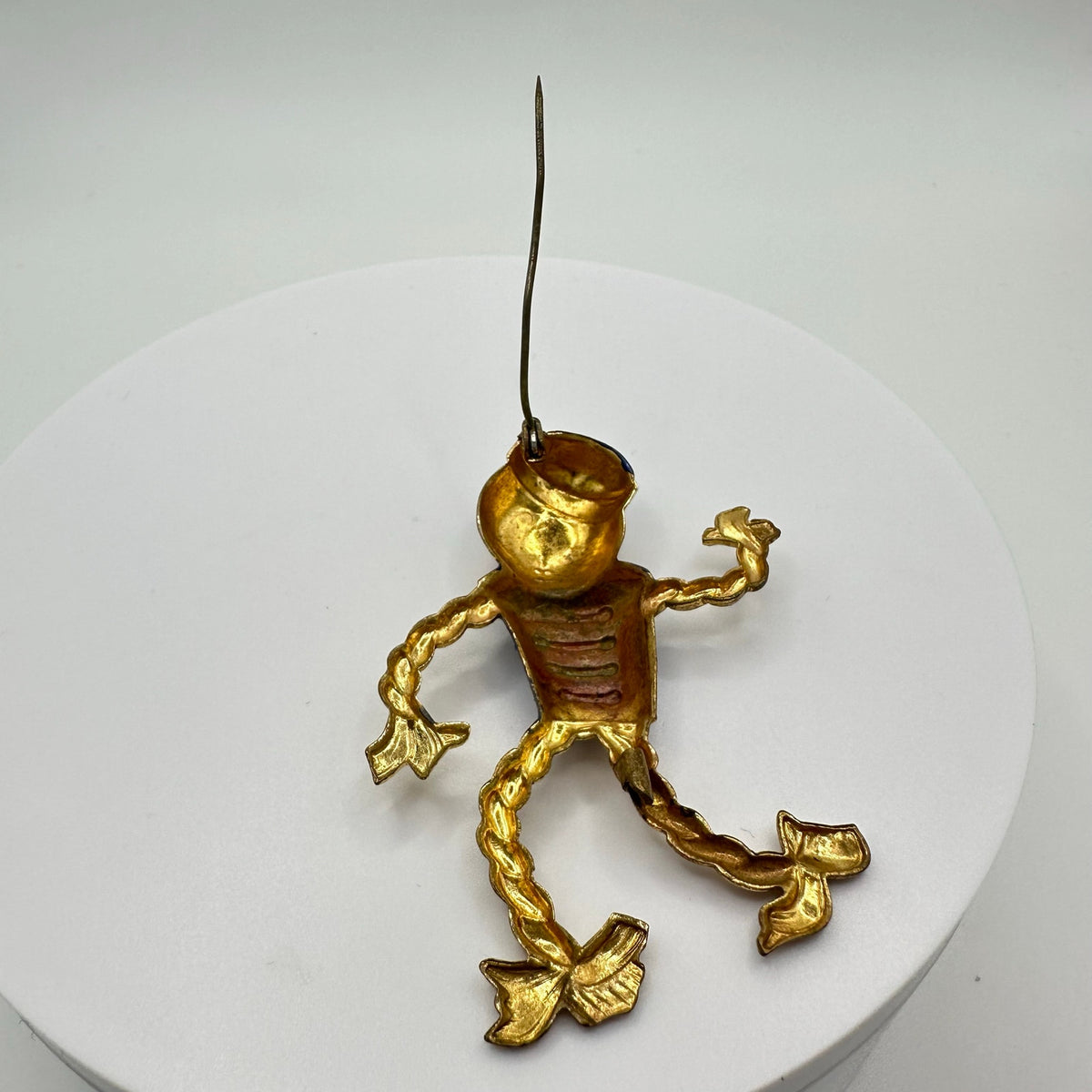 Antique Art Deco 1930s enamel brass boy bellhop Figural rope brooch pin