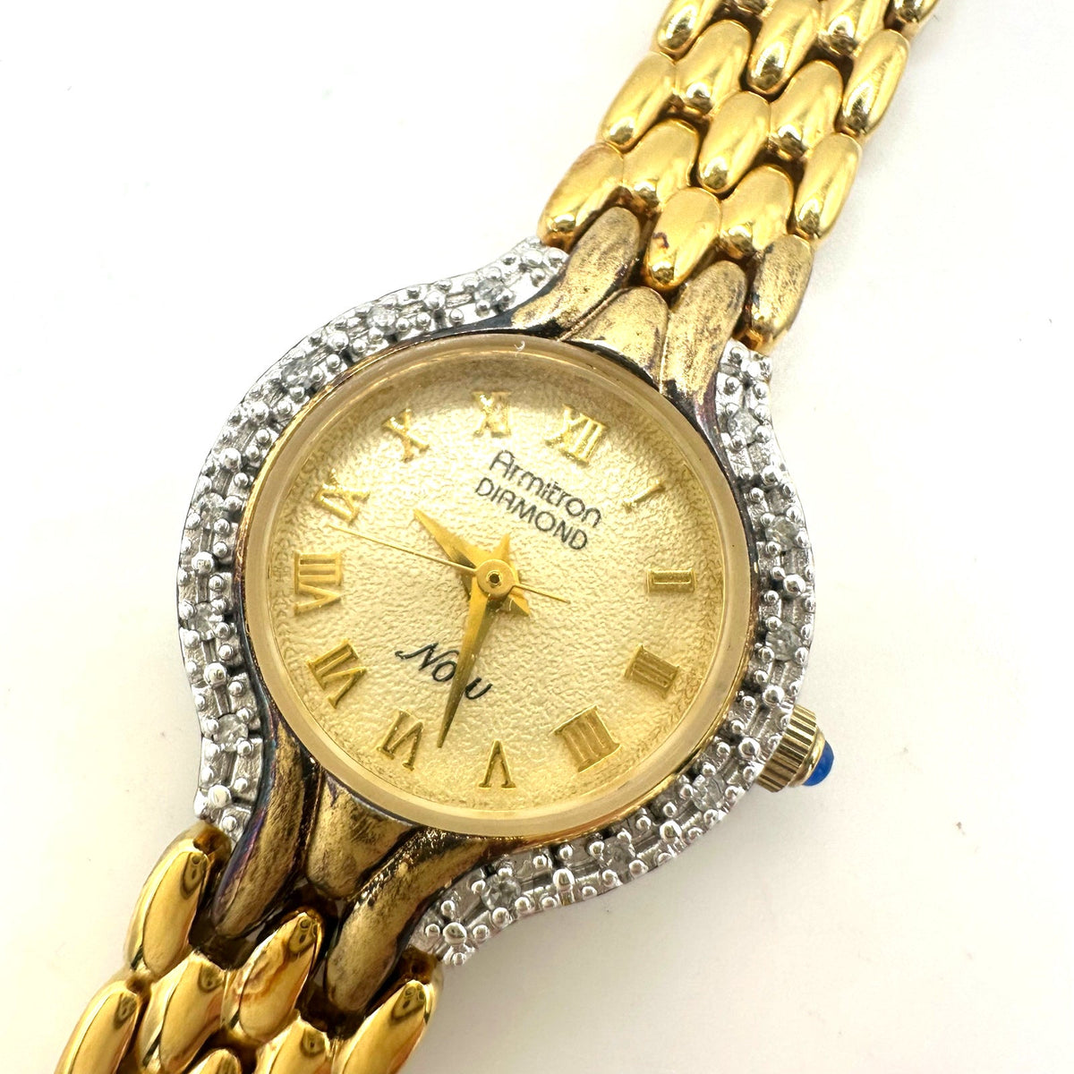 Armitron real diamonds Quartz gold tone round 20.5mm dial stainless steel watch