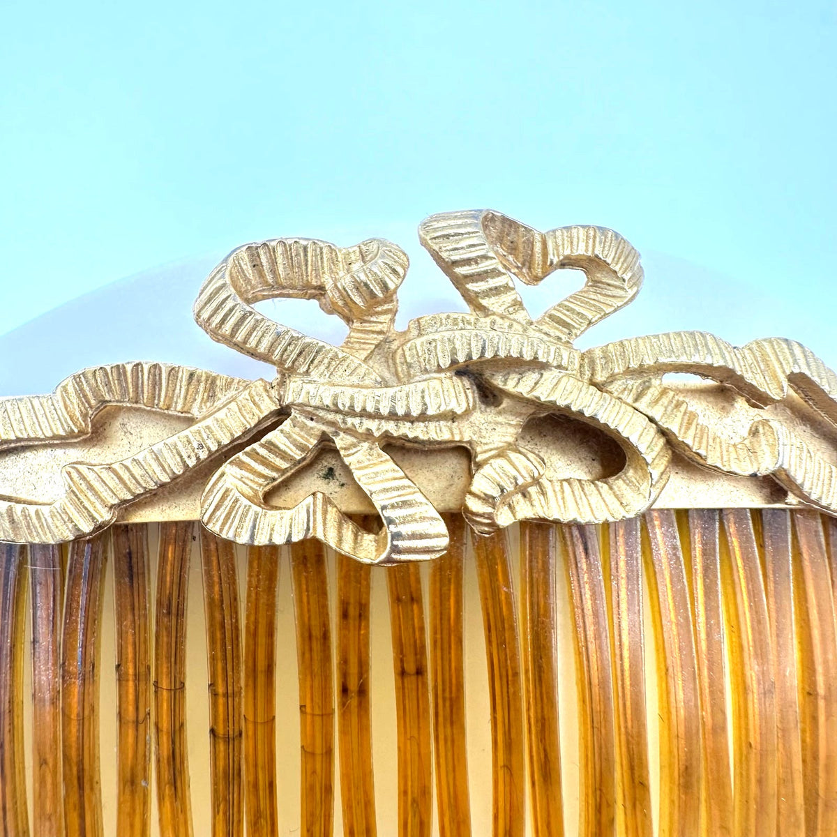 Kirks Folly set 2 gold tone ribbon bows faux tortoiseshell hair combs made USA
