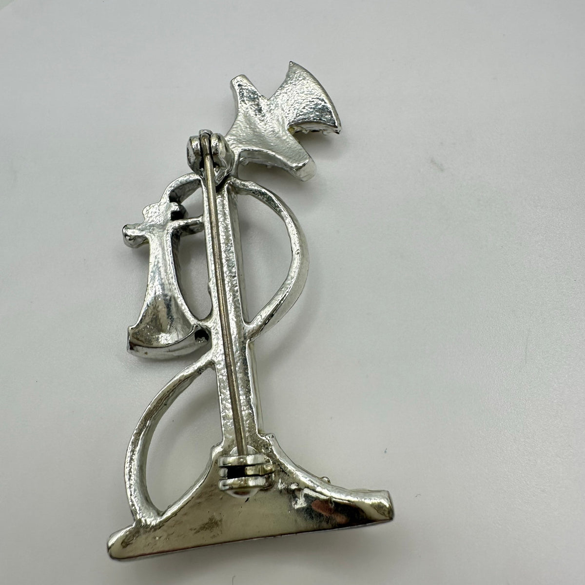 Vintage retro silver tone rhodium plated clear rhinestones telephone brooch