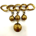 Antique Art Deco gold tone brass dangling ball charms chain bar pin brooch