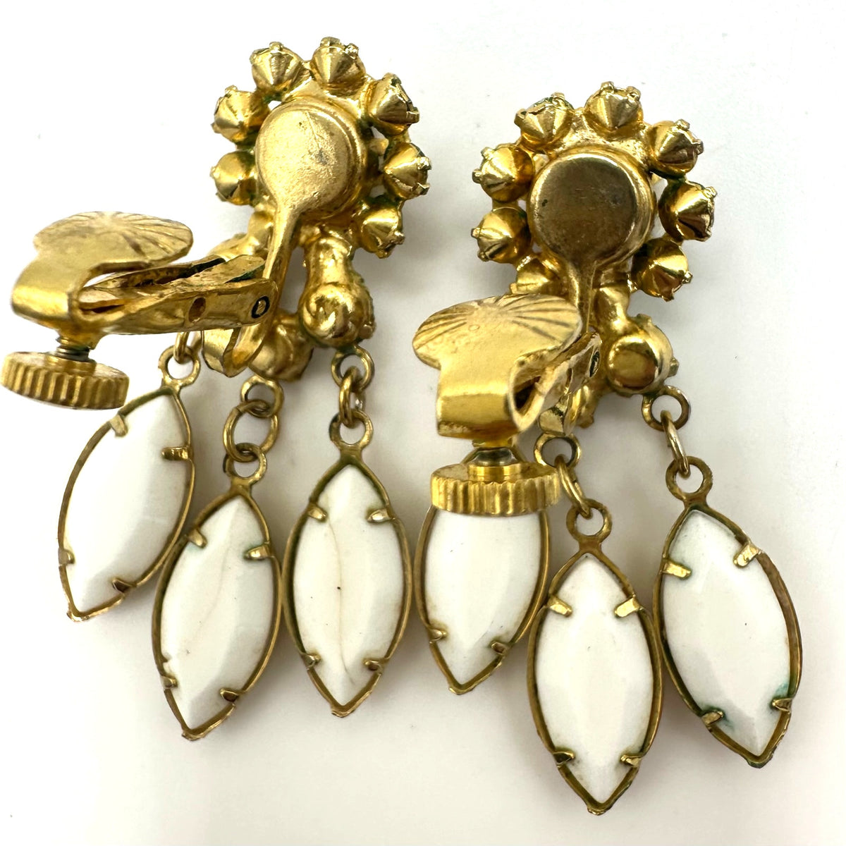 Vendome gold tone white milk glass rhinestones dangle clip on earrings