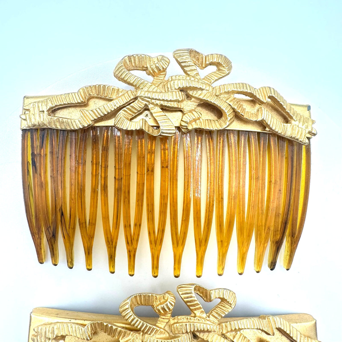 Kirks Folly set 2 gold tone ribbon bows faux tortoiseshell hair combs made USA