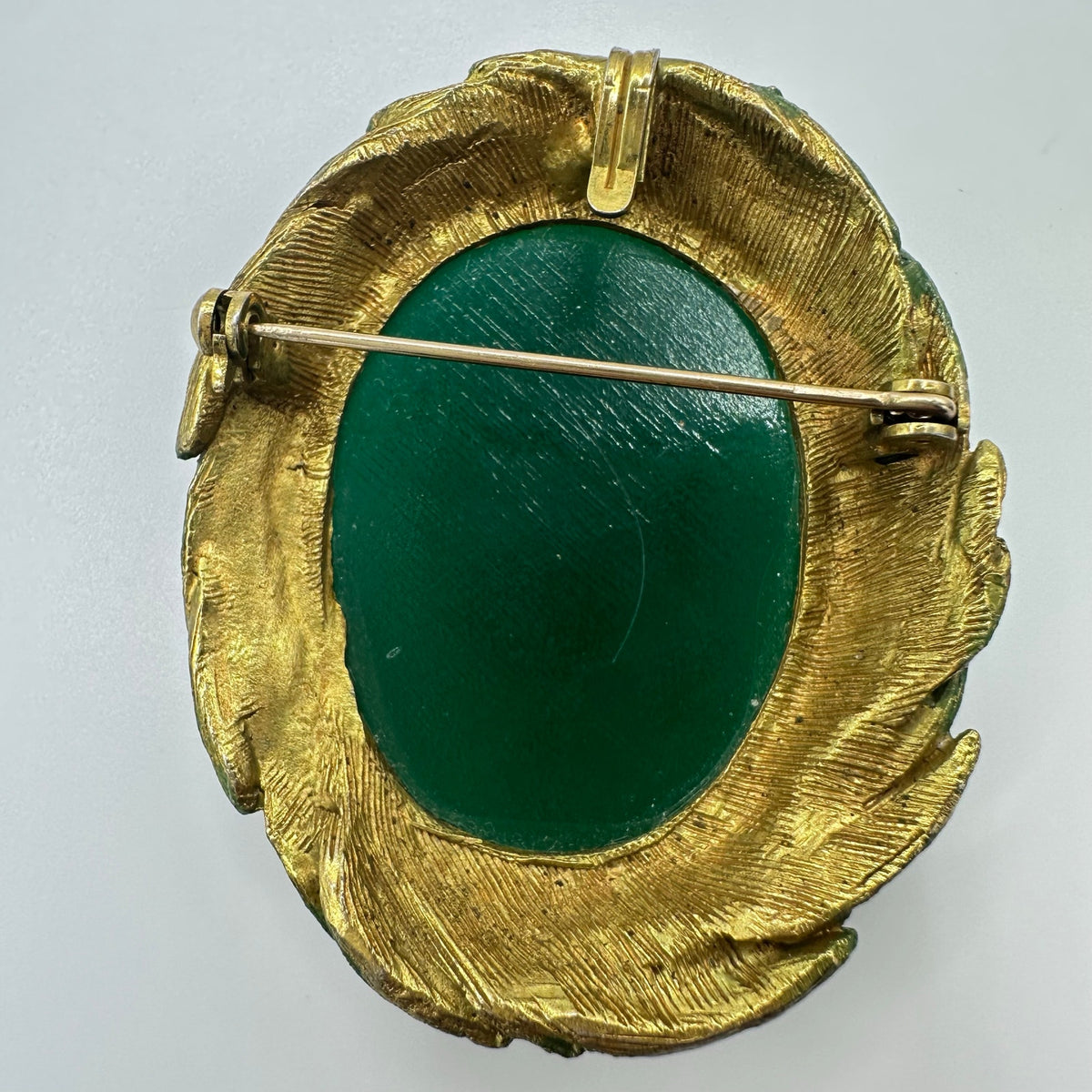 Vintage gold tone emerald green glass cabochon Victorian Revival brooch pendant