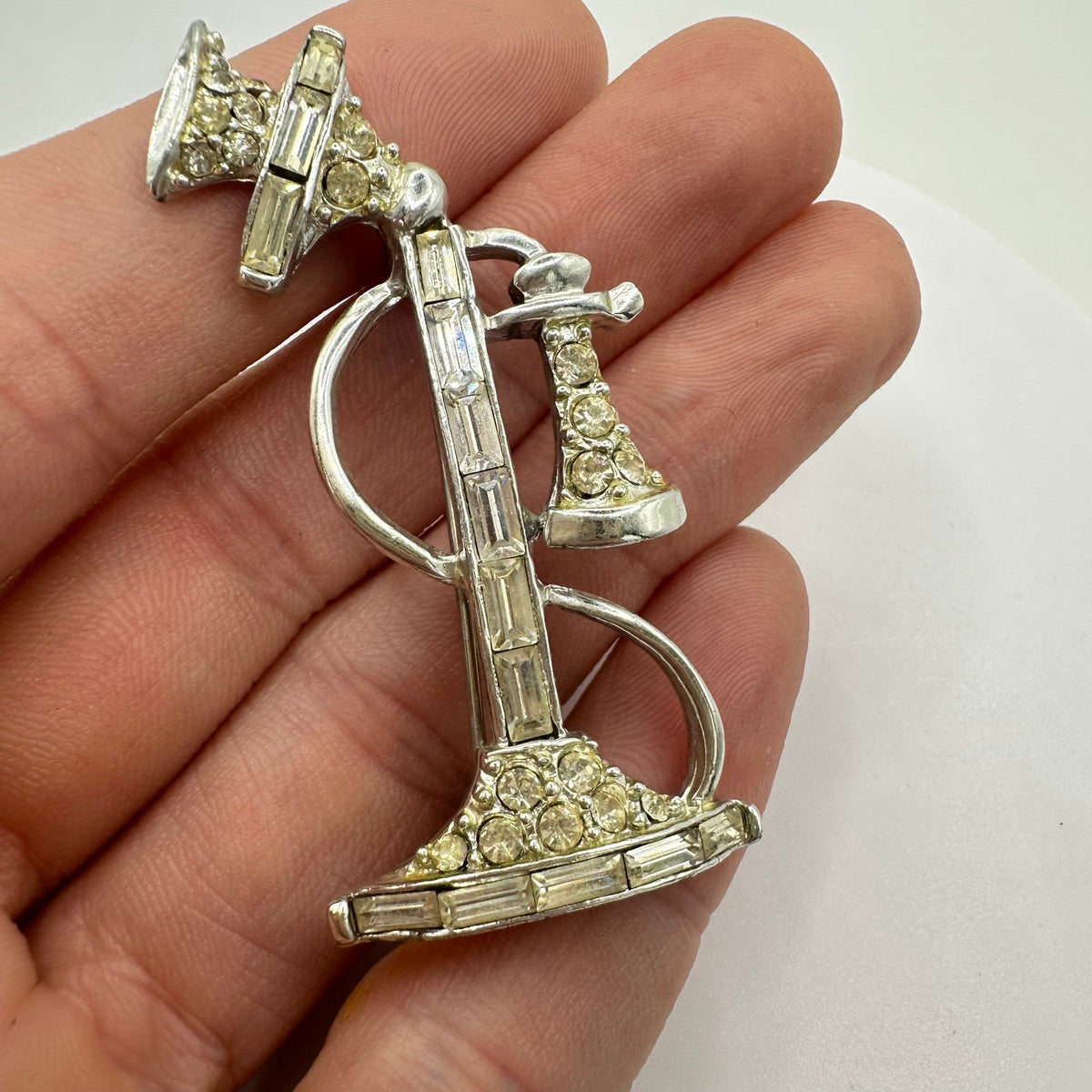 Vintage retro silver tone rhodium plated clear rhinestones telephone brooch