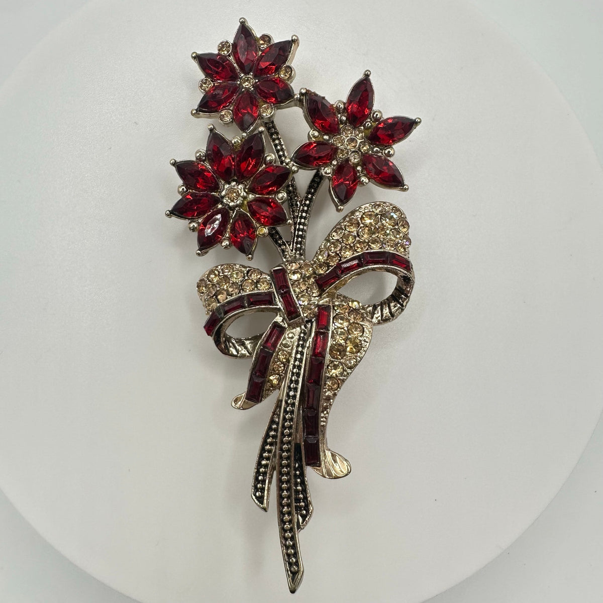 Avon 2013 gold tone red topaz rhinestones poinsettias flowers bouquet brooch