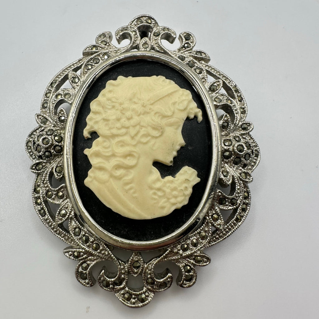 Silver tone rhodium plated genuine marcasite black white cameo brooch pendant