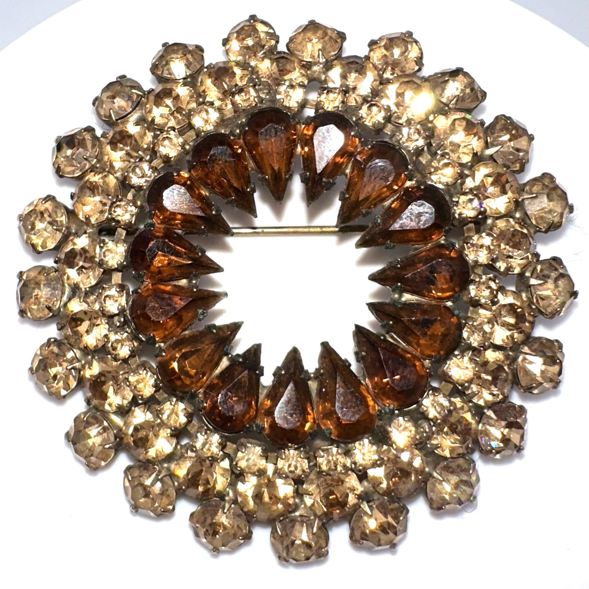 Vintage gold tone amber topaz glass rhinestones round circular wreath brooch