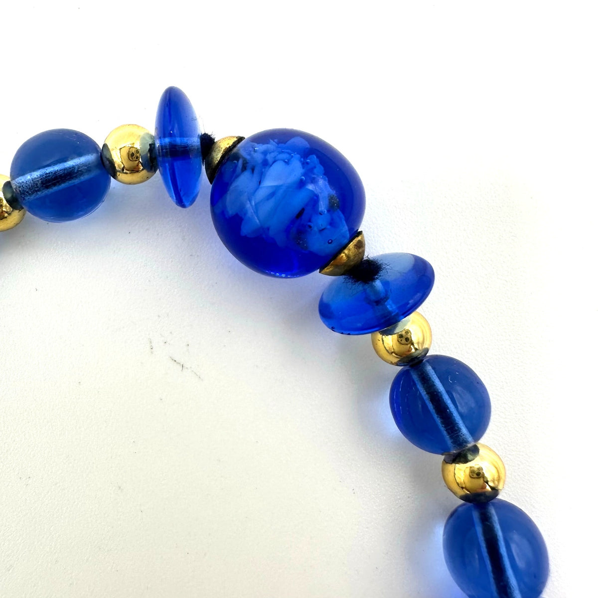 Vintage Art Deco Revival blue glass beads gold tone 21" graduated necklace
