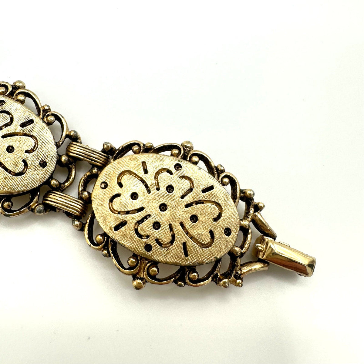 Emmons vintage gold tone dogwood floral textured flex link chain bracelet 7.25"