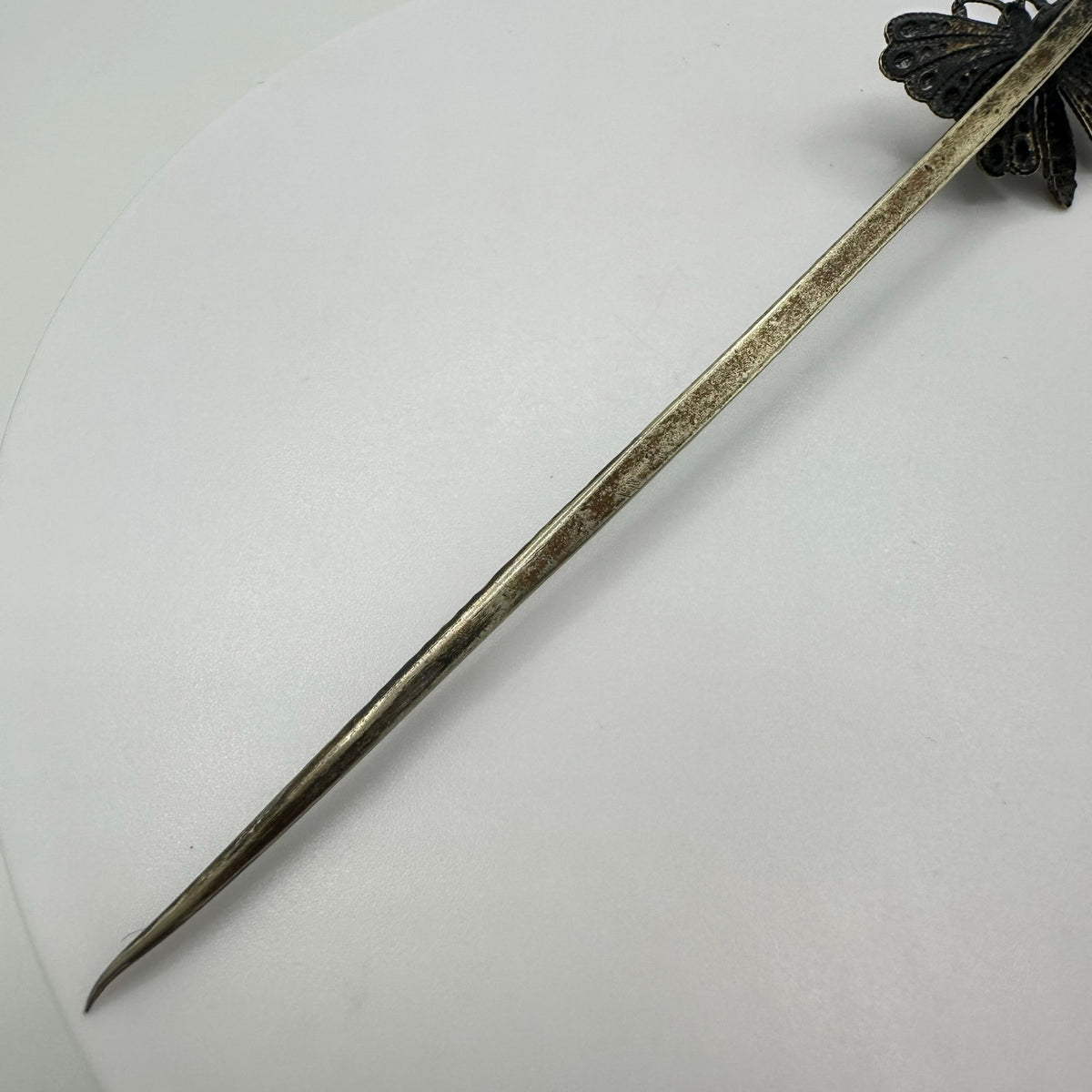 Antique Victorian silver tone textured butterfly clear paste gemstone stick pin
