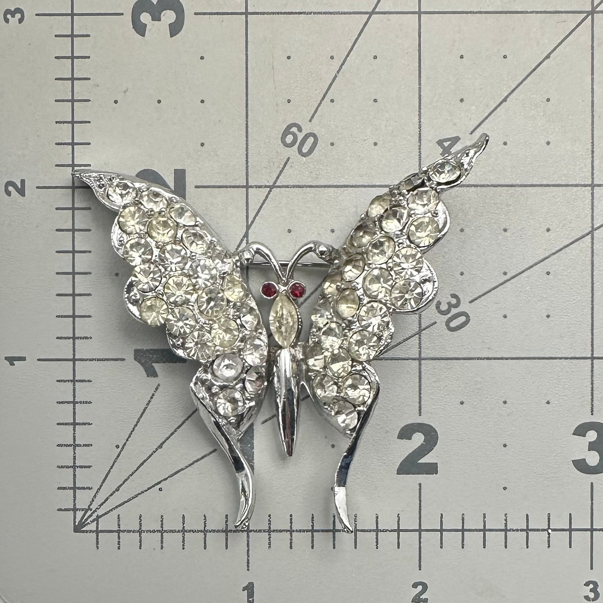 Vintage 1940s silver tone rhodium plated clear red rhinestones butterfly brooch