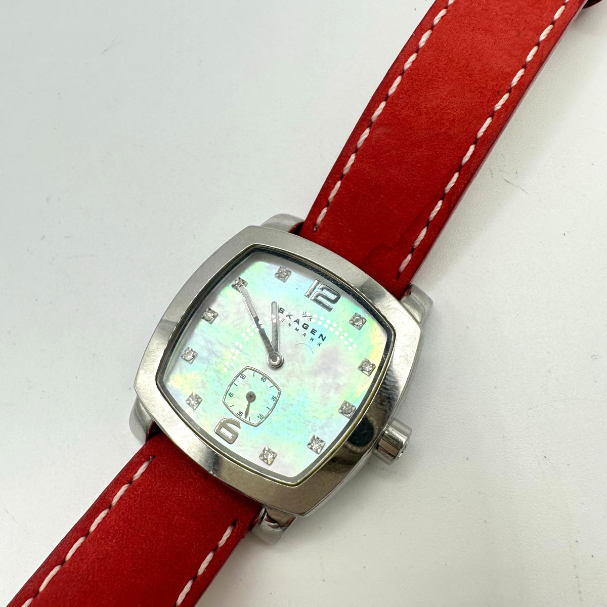 Skagen quartz silver tone mother of pearl rounded square dial red leather watch