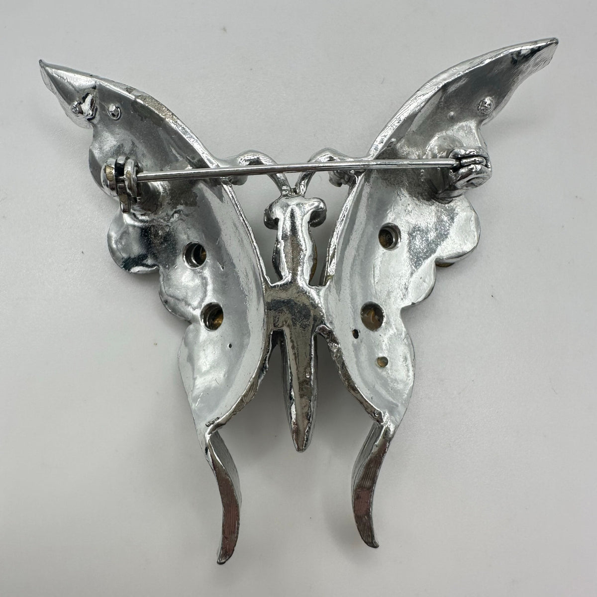 Vintage 1940s silver tone rhodium plated clear red rhinestones butterfly brooch