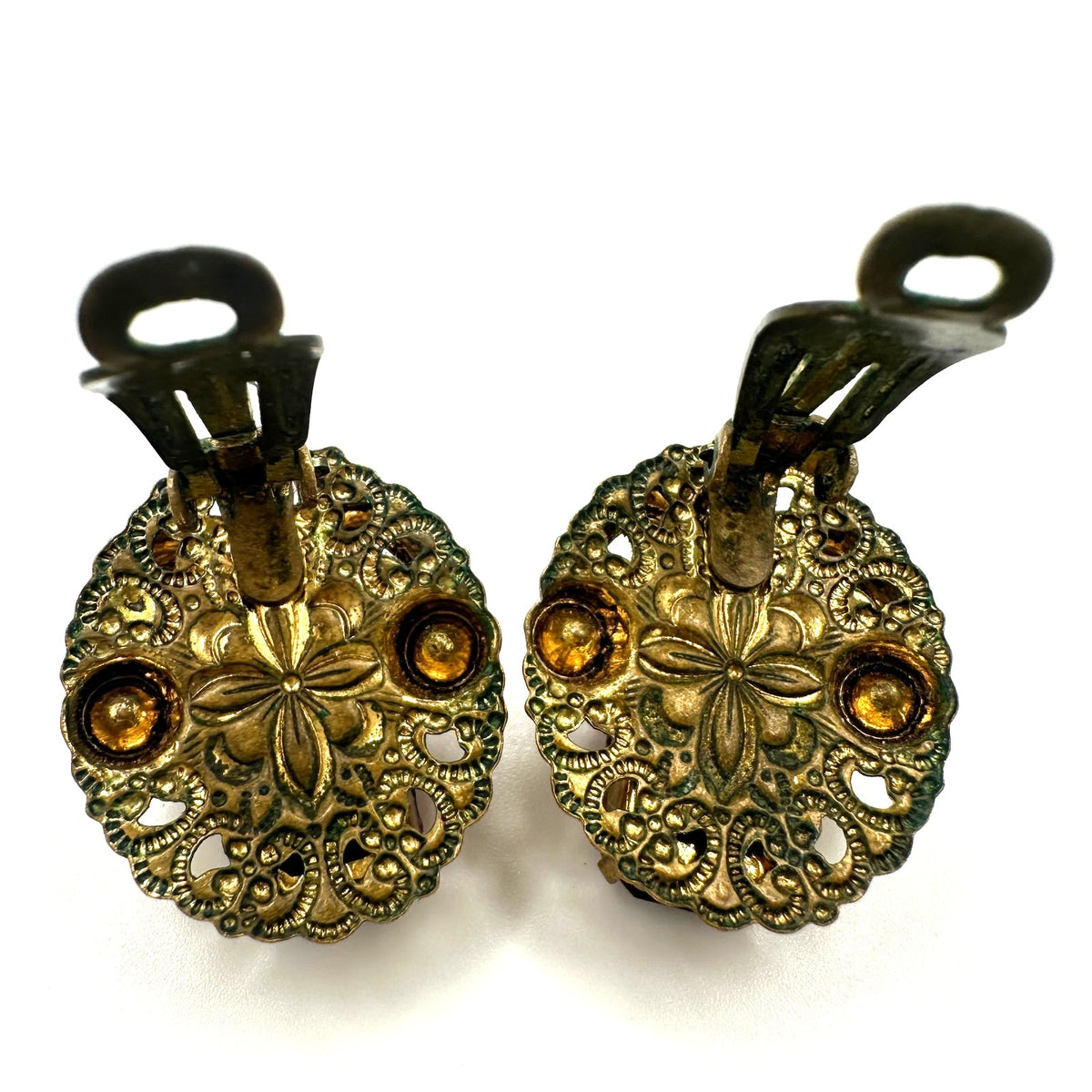 West Germany vintage gold tone filigree purple rhinestones clip on earrings