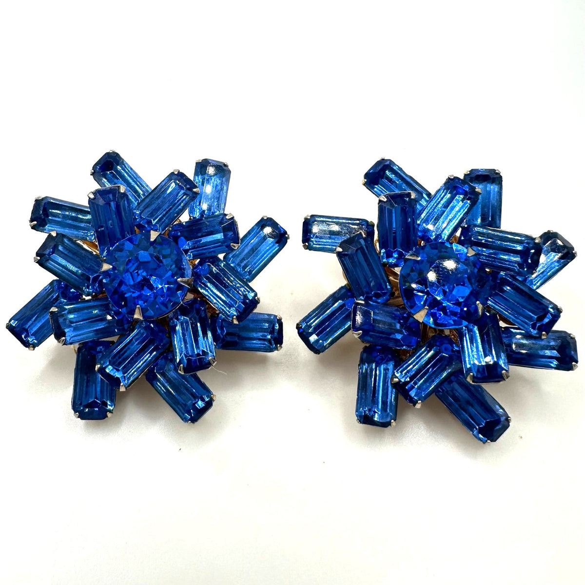 Vintage gold tone large royal blue glass rhinestones starburst clip on earrings