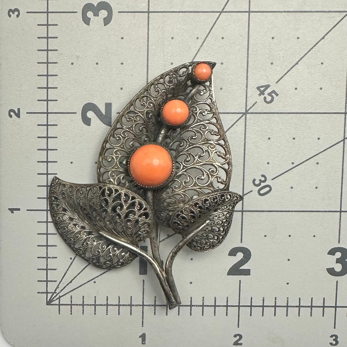 Vintage intricate silver tone filigree leaves orange glass cabochons brooch pin