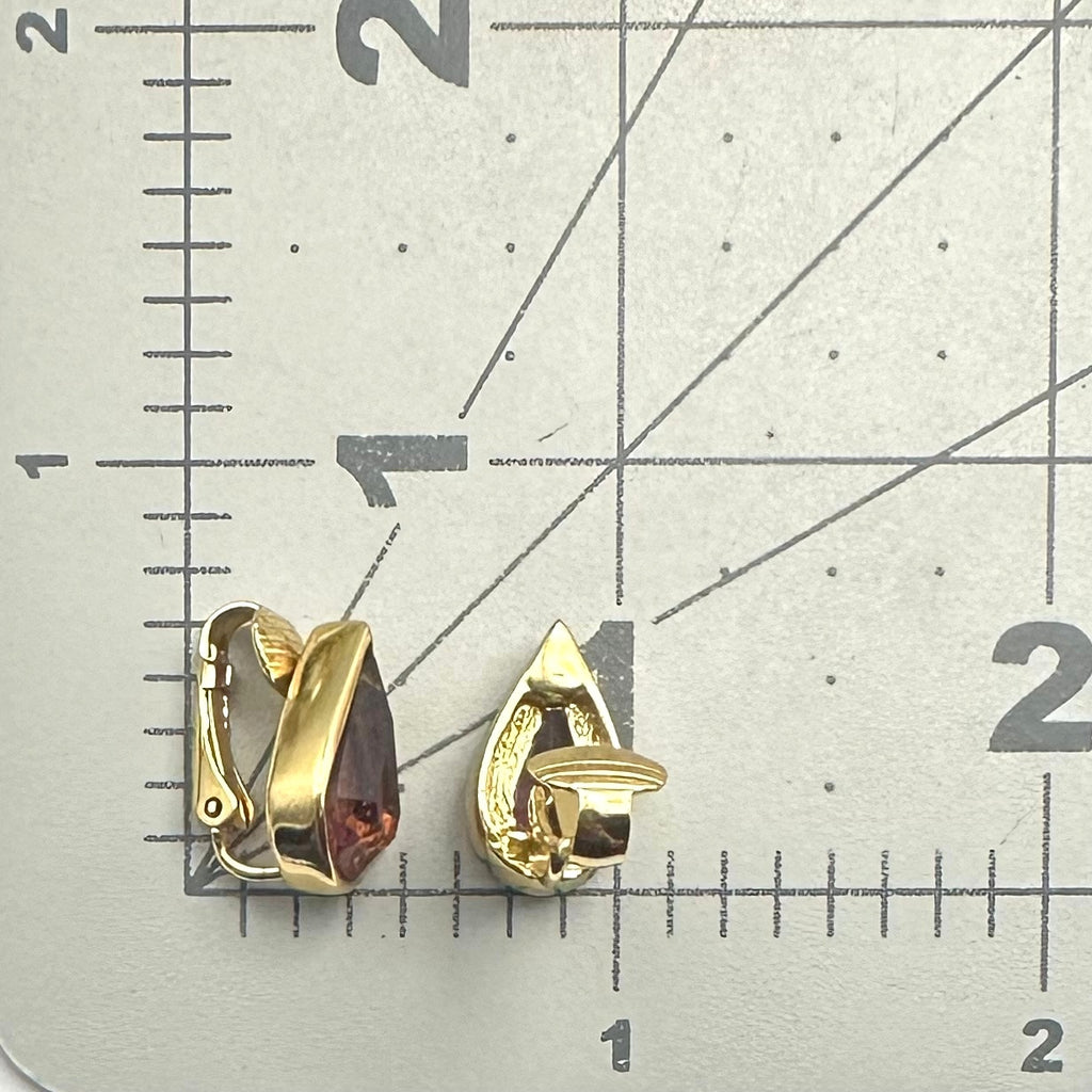 Christian Dior vintage gold plated purple glass rhinestones clip on earrings