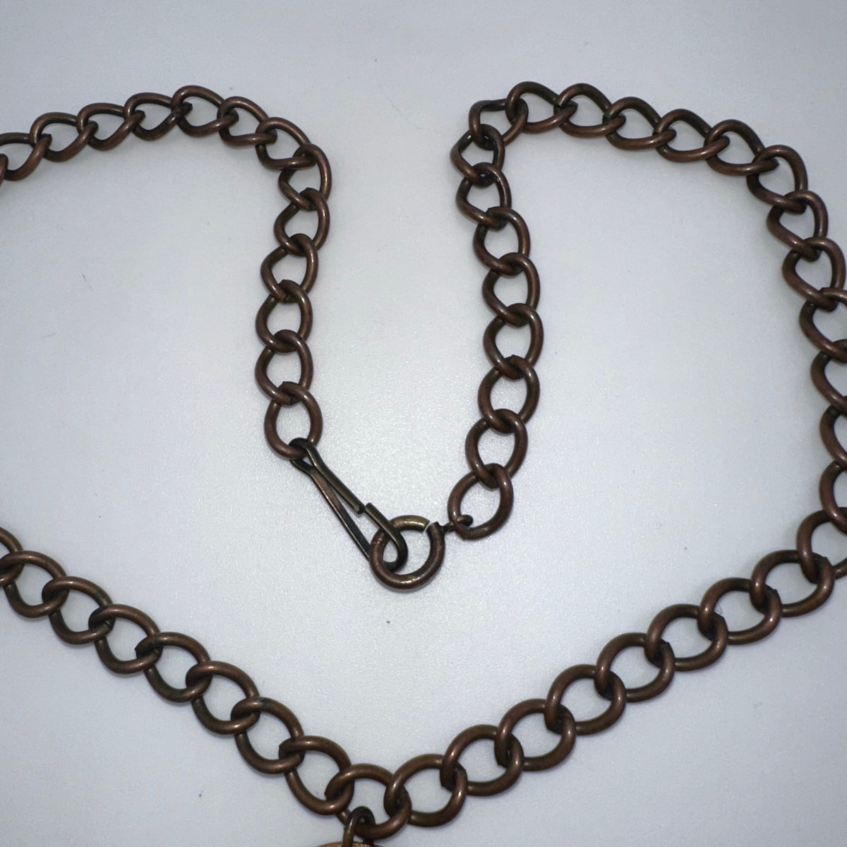 Vintage 1970s cast copper Viking figural pendant curb link chain necklace