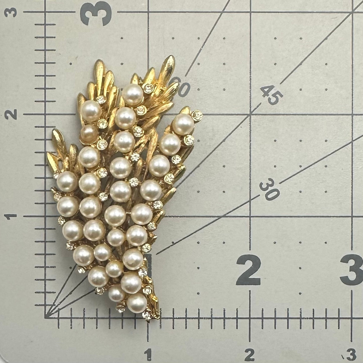BSK vintage gold tone clear rhinestones faux white pearls beaded leaves brooch