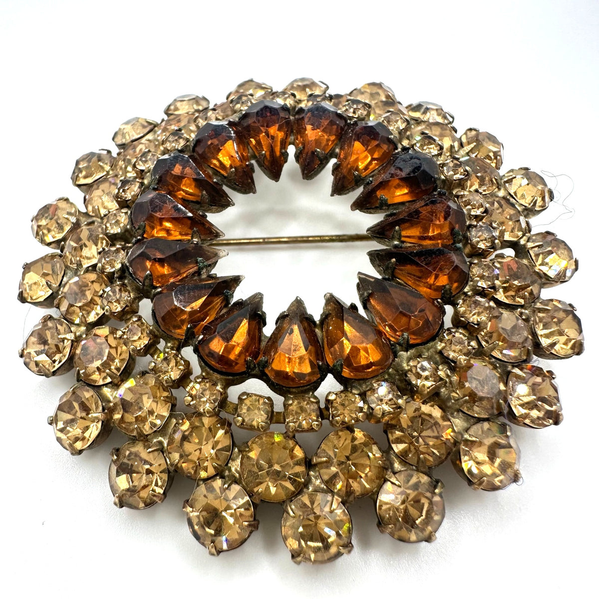 Vintage gold tone amber topaz glass rhinestones round circular wreath brooch