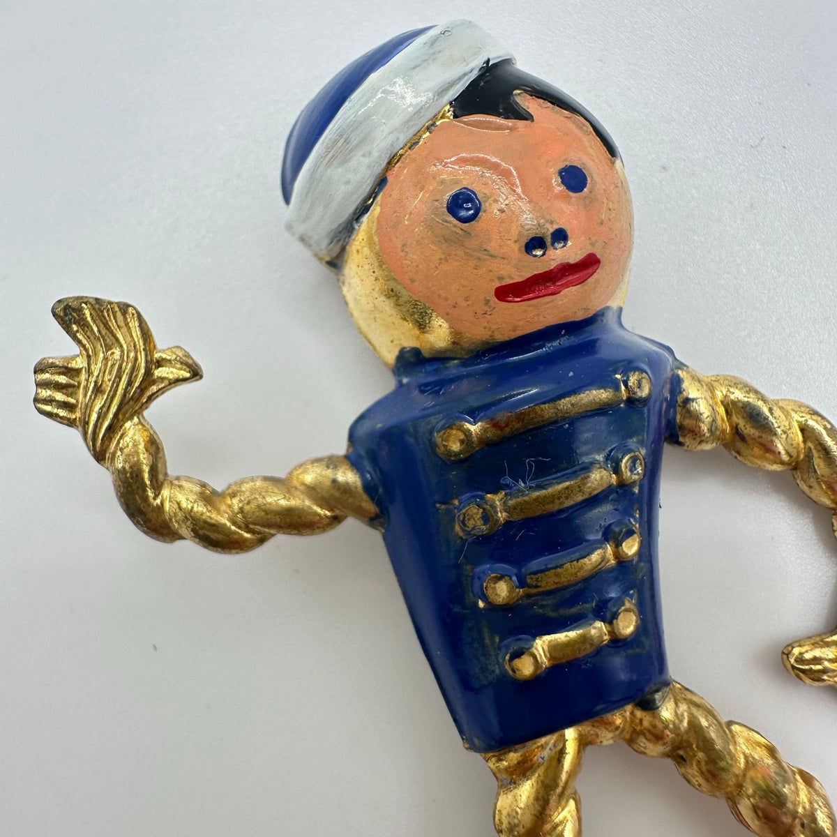 Antique Art Deco 1930s enamel brass boy bellhop Figural rope brooch pin