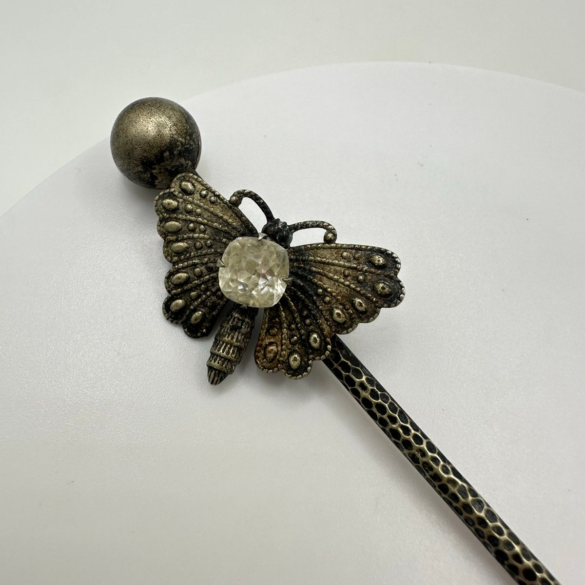Antique Victorian silver tone textured butterfly clear paste gemstone stick pin