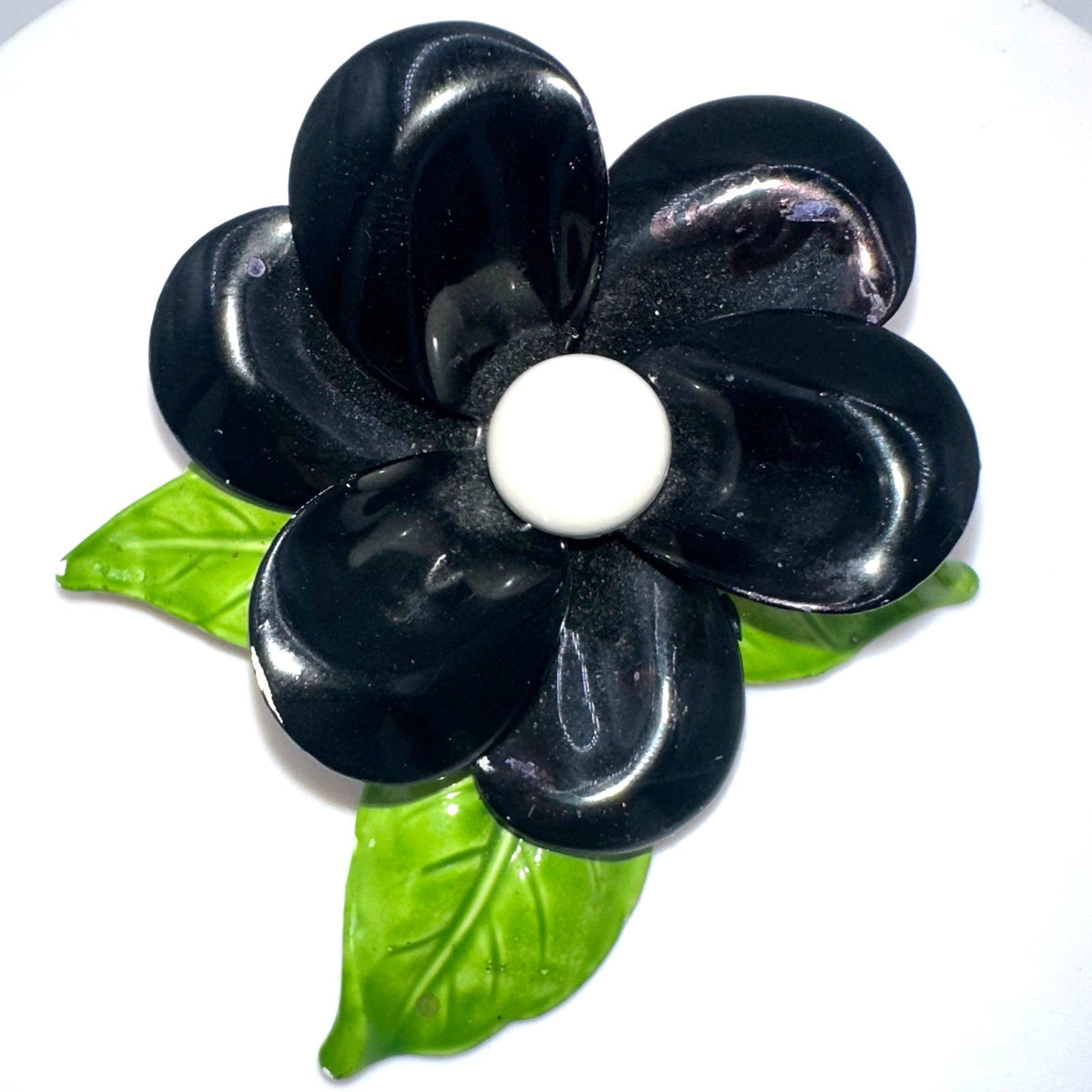 Vintage 1960s black white green enamel gold tone metal flower flower brooch