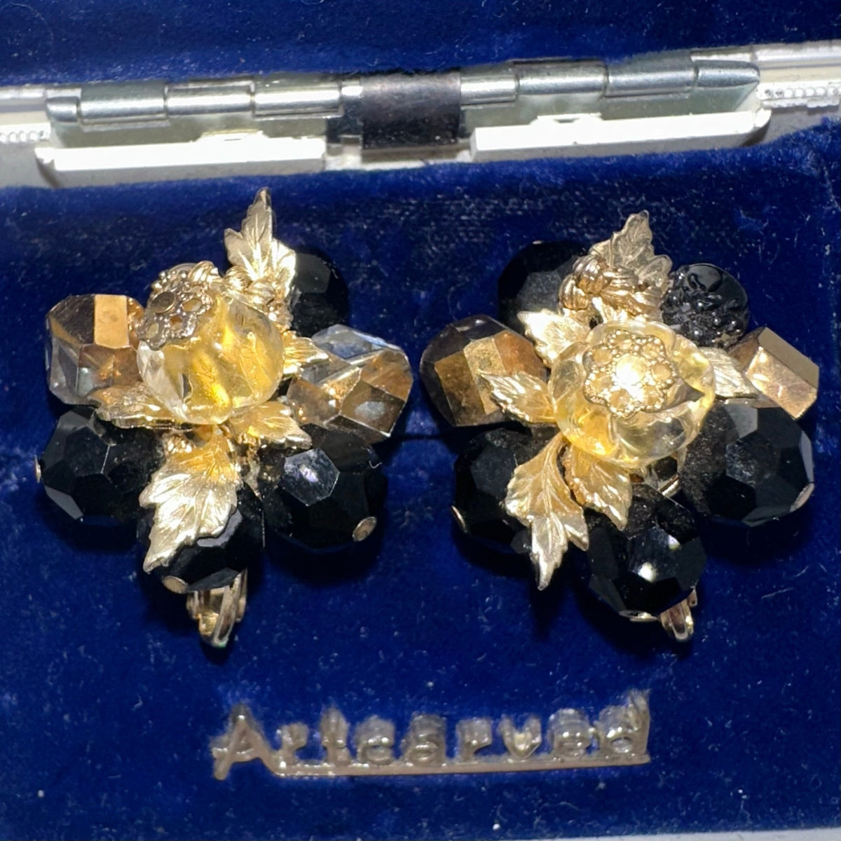 Vendome gold tone leaves black glass beads beaded cluster clip on earrings