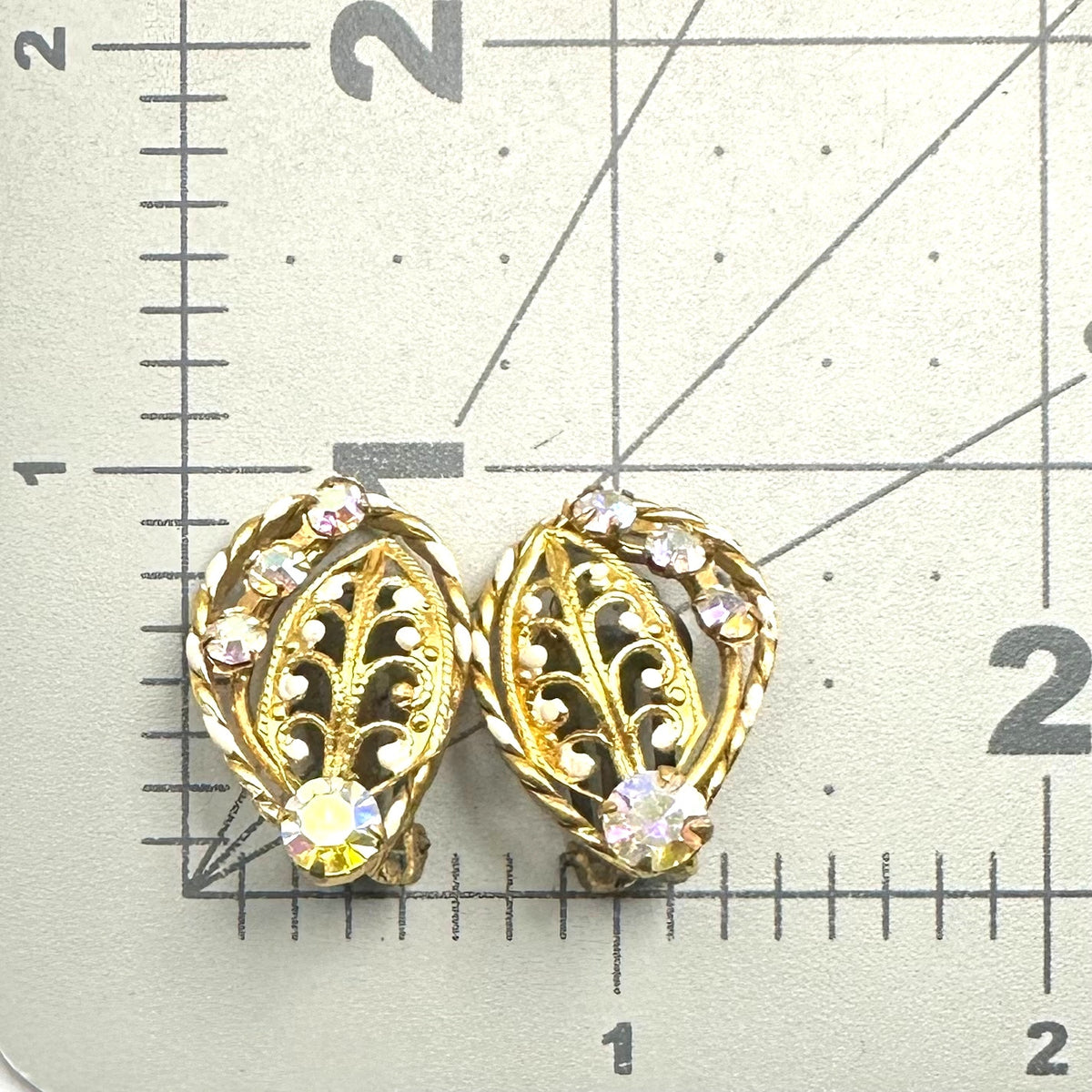 Austria vintage gold tone filigree leaves AB rhinestones clip on earrings