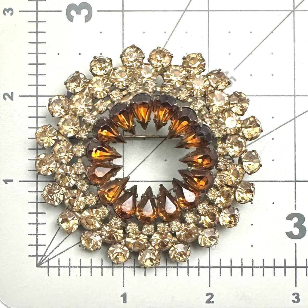 Vintage gold tone amber topaz glass rhinestones round circular wreath brooch