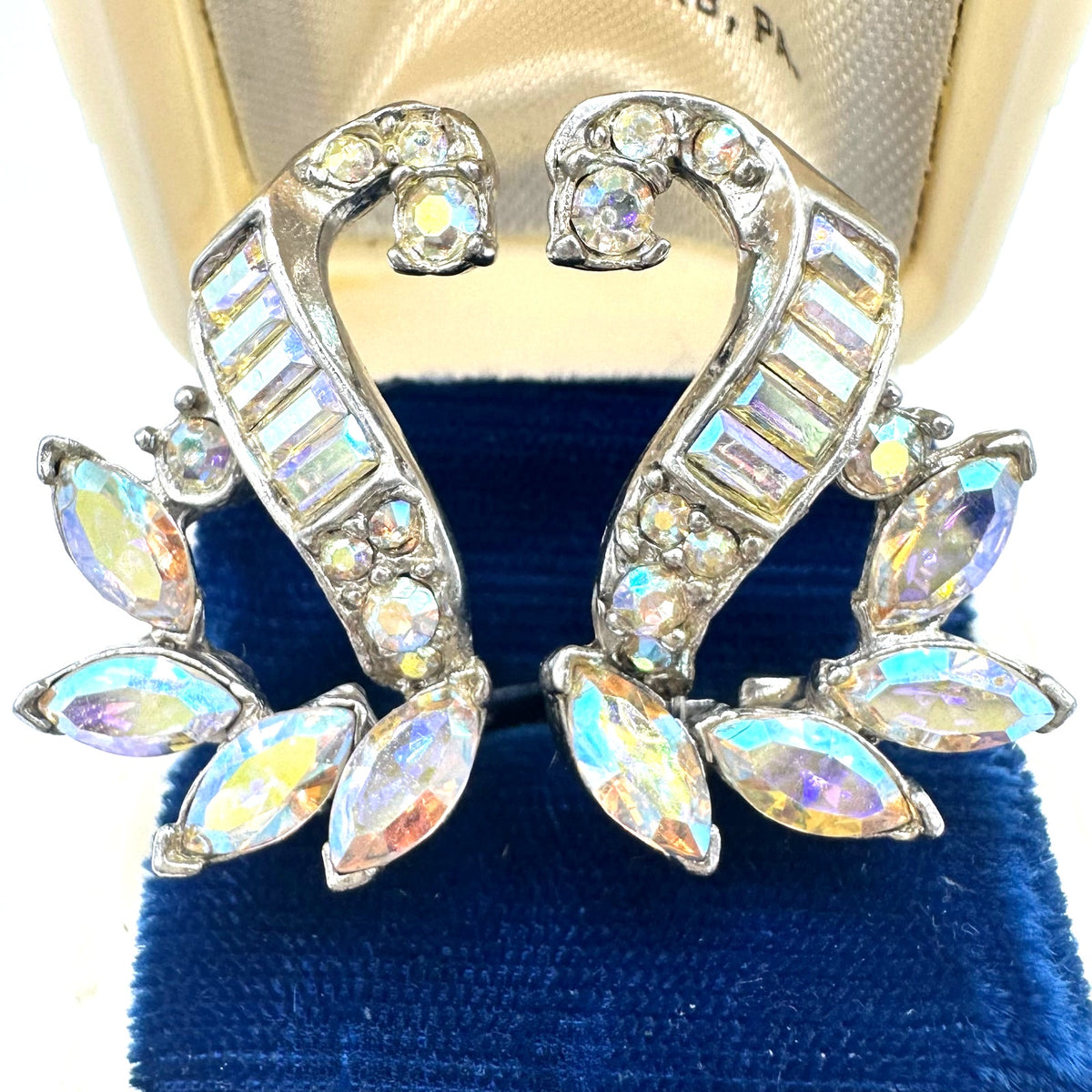 Vintage silver tone AB aurora borealis rhinestones scrolled clip on earrings