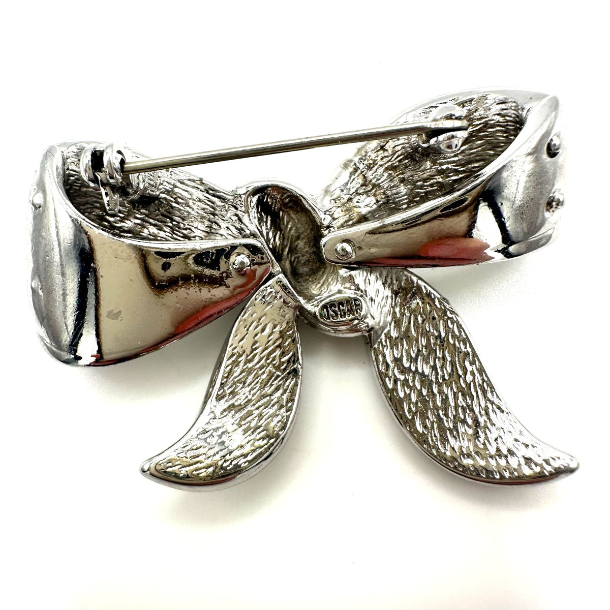 Oscar De La Renta vintage silver tone rhodium plate clear rhinestones bow brooch