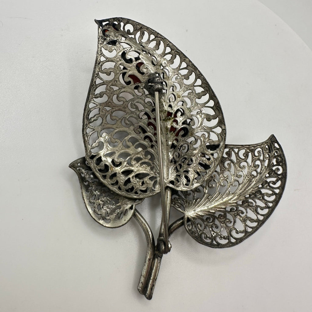 Vintage intricate silver tone filigree leaves orange glass cabochons brooch pin