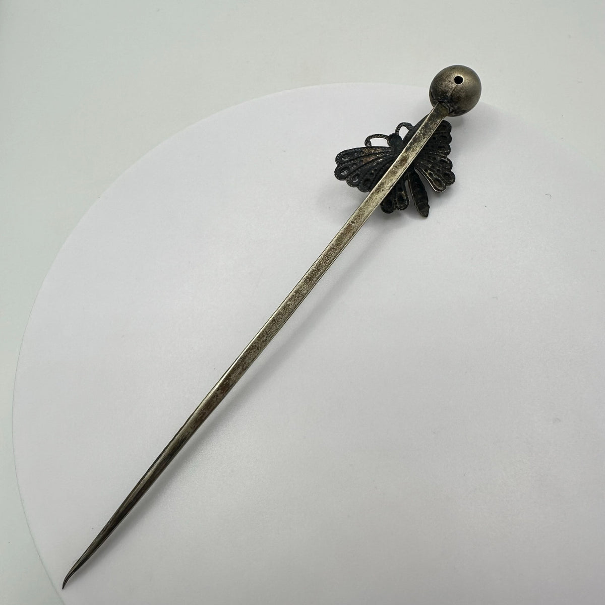 Antique Victorian silver tone textured butterfly clear paste gemstone stick pin