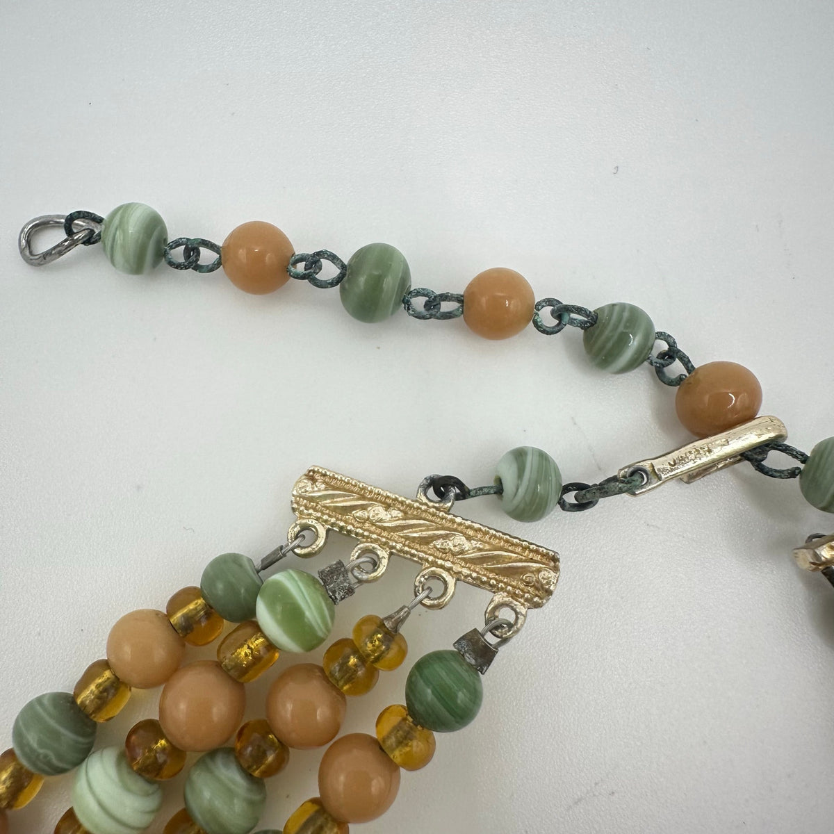 Japan vintage 4 multi strand green tan amber art glass beaded graduated necklace