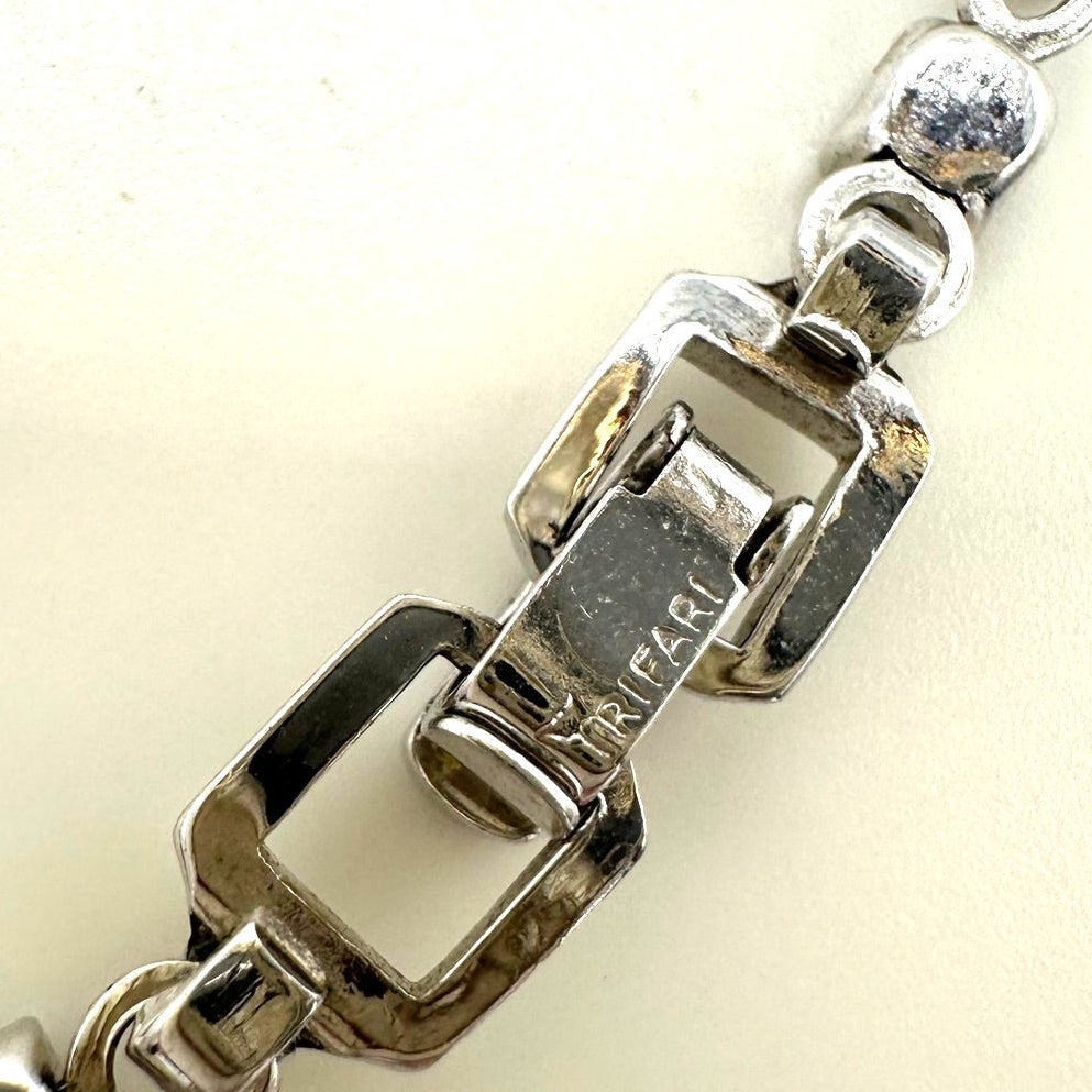 Crown Trifari silver tone rhinestones dangling hearts tennis 6.5" bracelet