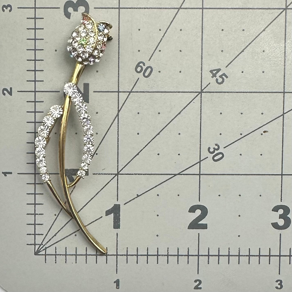 Gold tone clear multicolor glass rhinestones rose flower floral brooch