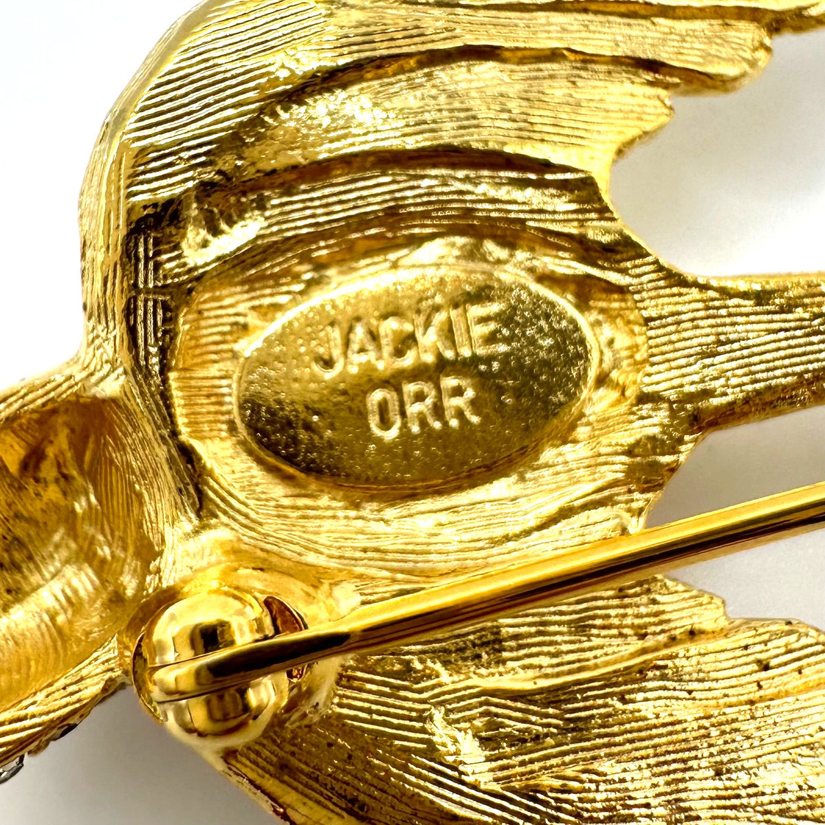 Jackie Orr vintage gold tone clear glass rhinestones pearl bird brooch