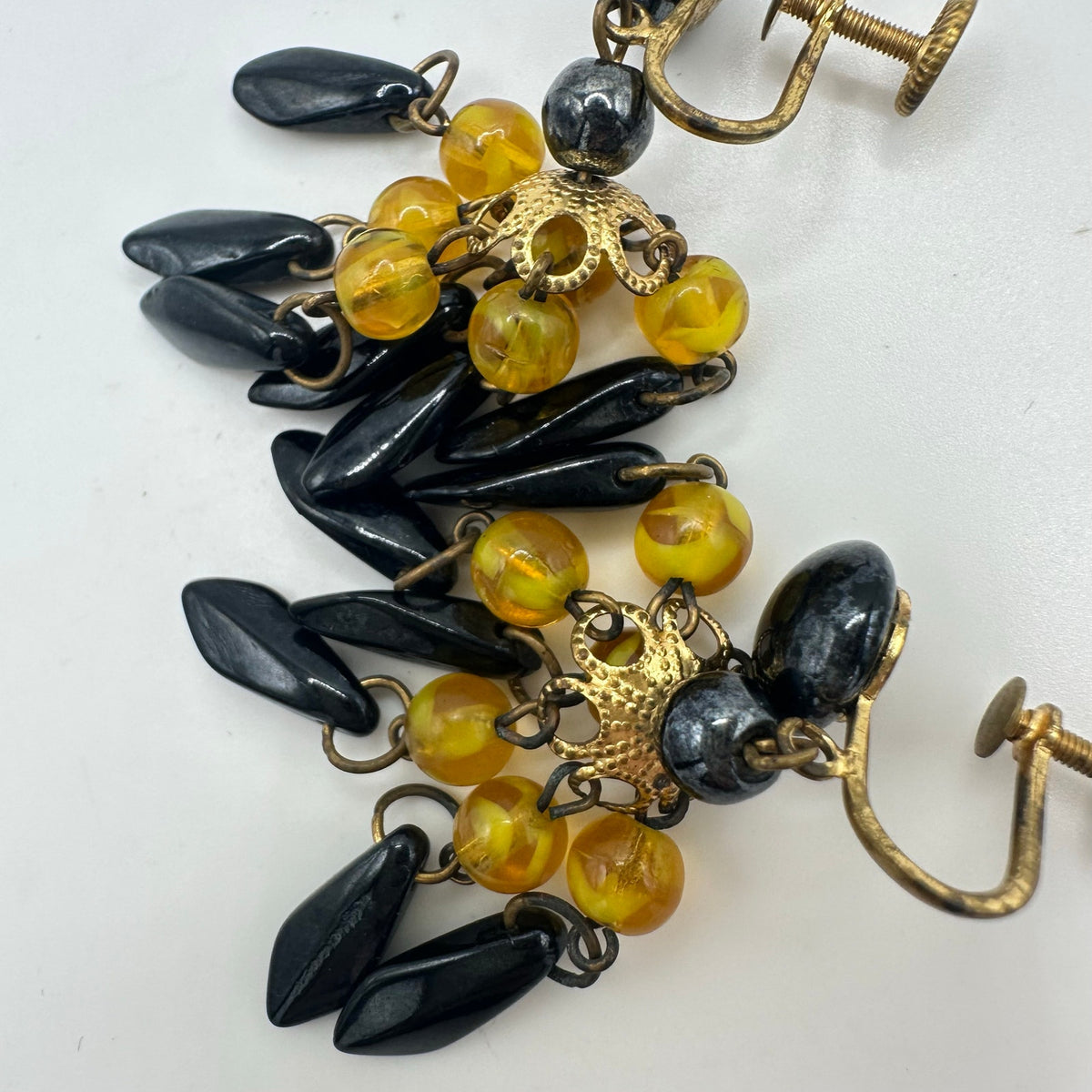 West Germany vintage gold yellow black glass beaded dangle screw back earrings